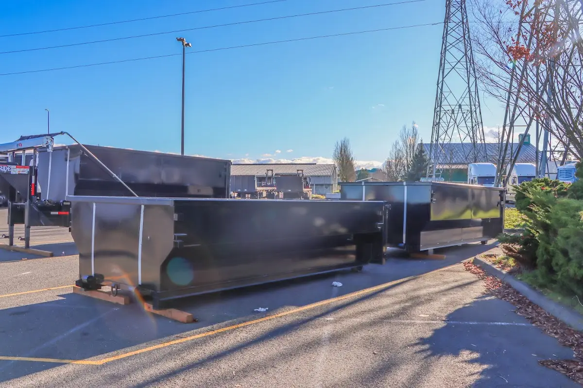 Roll-off dumpster ready for waste disposal at job site for 3 Yard Dumpster Rental in Pontiac